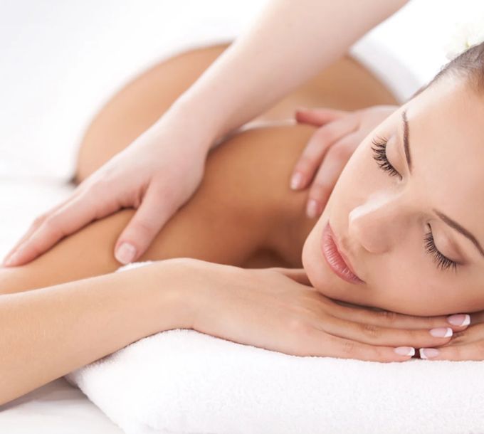 Woman relaxing during a back massage