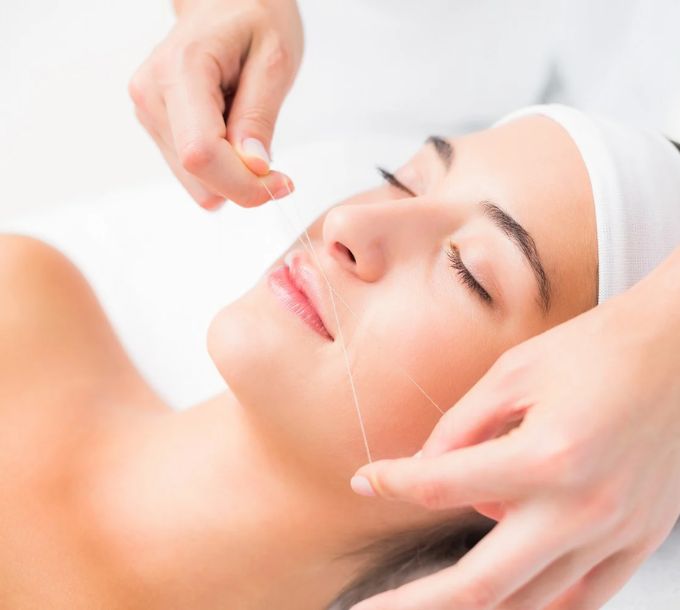 Facial threading treatment