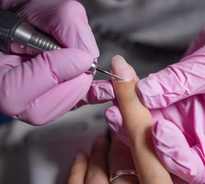Russian manicure using an e-file on the cuticles