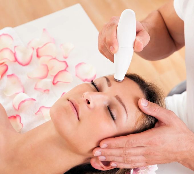 Client receiving a microdermabrasion facial