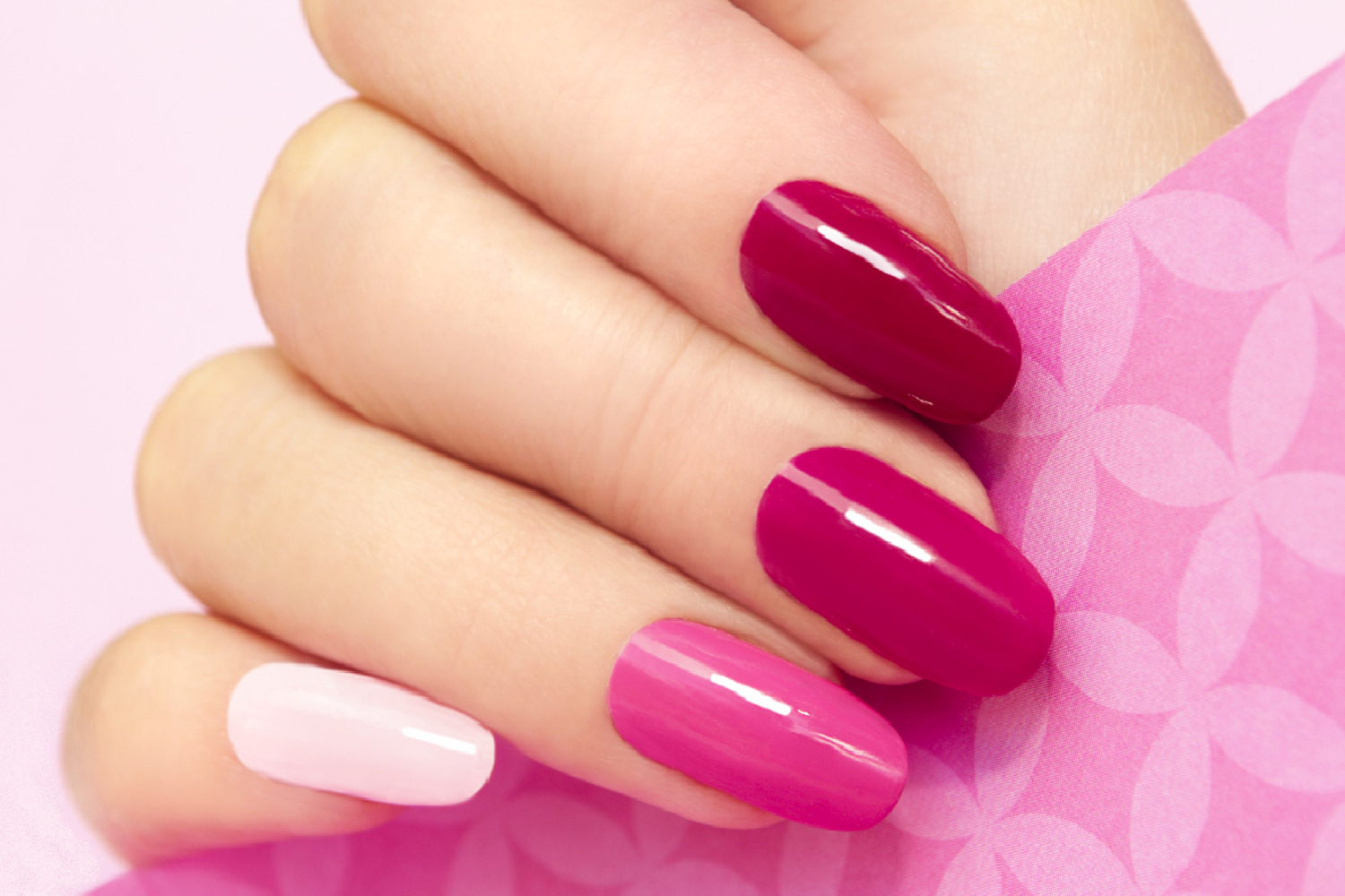 Glossy berry-pink gel nails