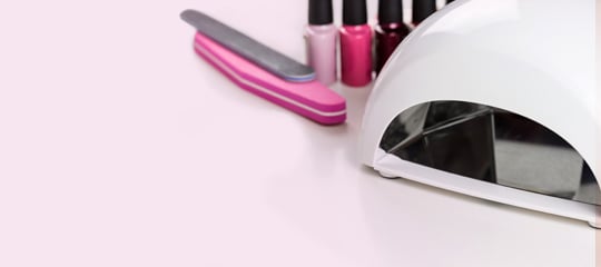 Gel nail polishes and a UV nail lamp