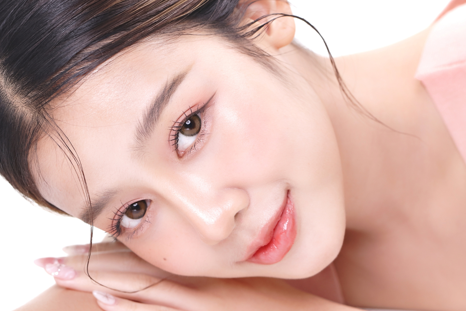 Woman with smooth, glowing Korean glass skin