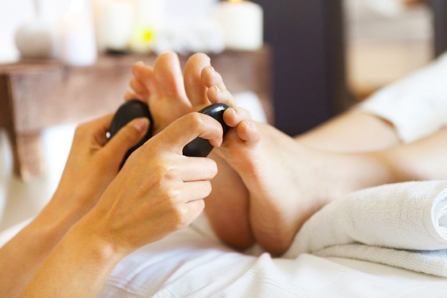 Hot rocks pedicure foot massage
