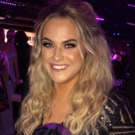 Betsy-Dora, a graduate of The Beauty Academy